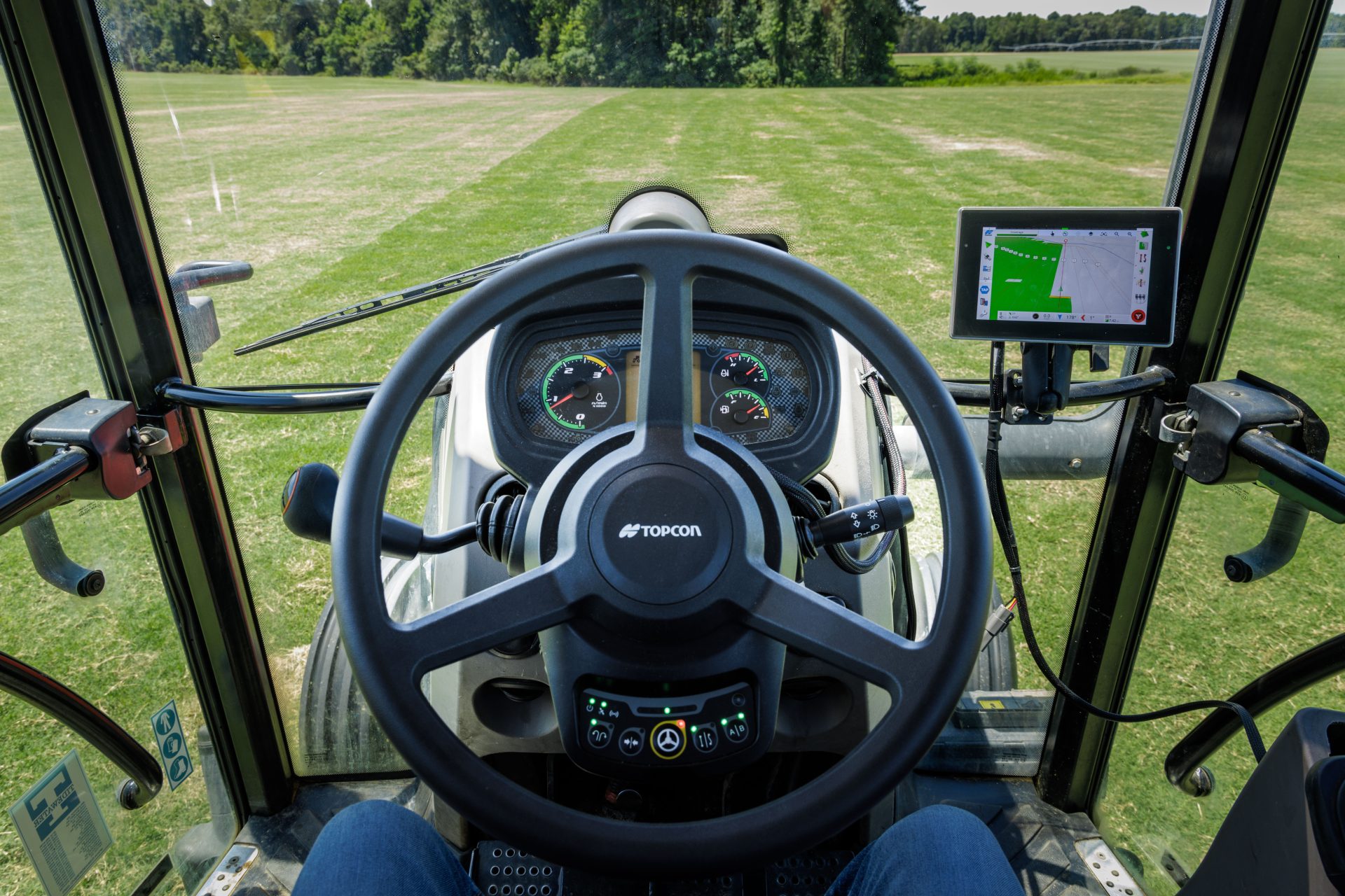 Auto steering for mid-range tractors