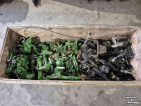 Used parts for tractors John Deere trekhaken handmatig en automatisch 330 cm en 390 cm breed