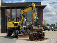 Excavator mobile Wacker Neuson EW 100 Airco Powertilt 3 Bakken Palletvork  Steunpoten