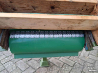 Conveyor  Kistenvulband